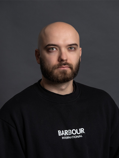 Loughborough Business School Communications Manager, Will Blackshaw, looking to the camera.